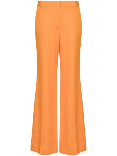 STELLA MCCARTNEY MID-RISE FLARED TROUSERS