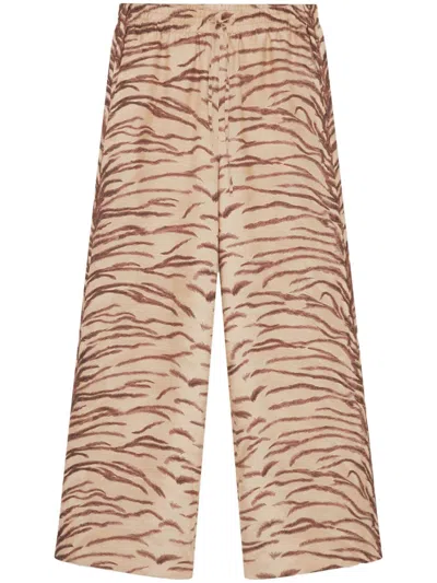 Stella Mccartney Tiger-print Organic Silk Trousers In Beige