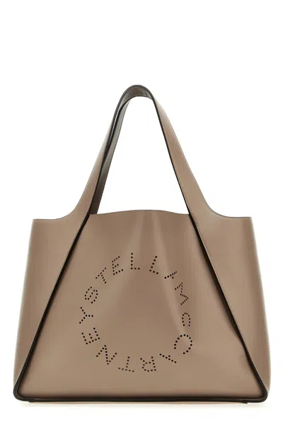 Stella Mccartney Shopping 'the Logo Bag' In Sand