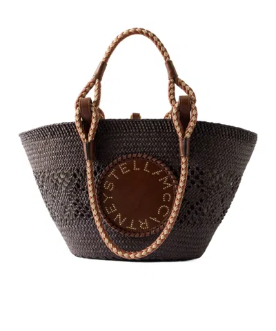 Stella Mccartney Small Vegetarian Leather-trimmed Raffia Tote In Brown