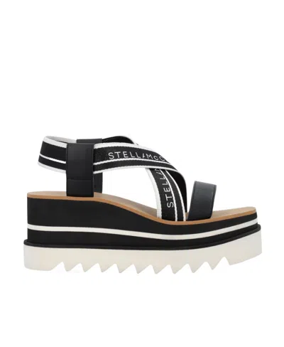 STELLA MCCARTNEY STELLA MCCARTNEY SNEAK-ELYSE CROSSOVER STRAP PLATFORM SANDALS