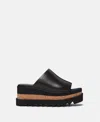 Stella Mccartney Portina 90 Logo-embossed Wedge Mules In Ebony Black