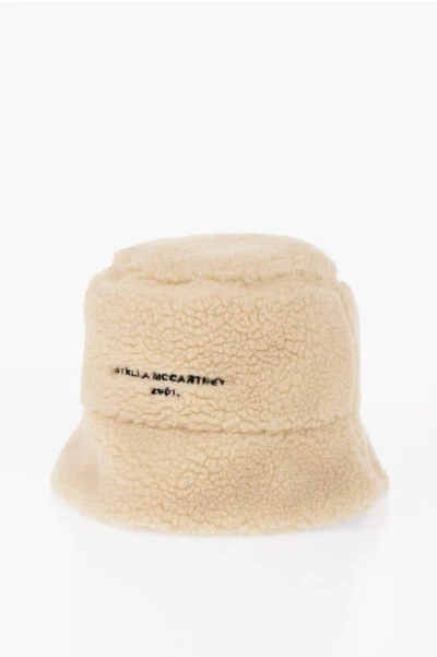 Stella Mccartney Solid Color Reversible Bucket Hat In Gold