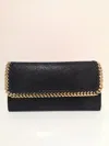 Stella Mccartney Black And Golden Continental Falabella Wallet In Black