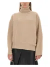 Stella Mccartney Textured Knit Oversized Turtleneck Shirt In Beige
