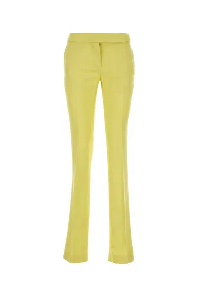 Stella Mccartney High-rise Flare Crepe Trousers In Yellow