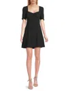 Stellah Bow Mini Dress In Black