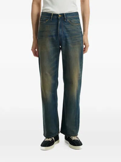 Stockholm Surfboard Club Frank Logo-embroidered Jeans In Blue
