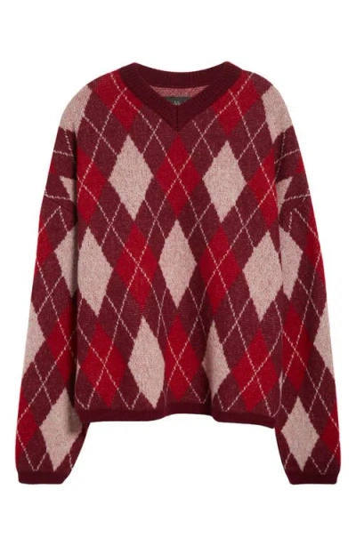 Stockholm Surfboard Club Gyle Argyle Merino Wool Blend Sweater In Pink