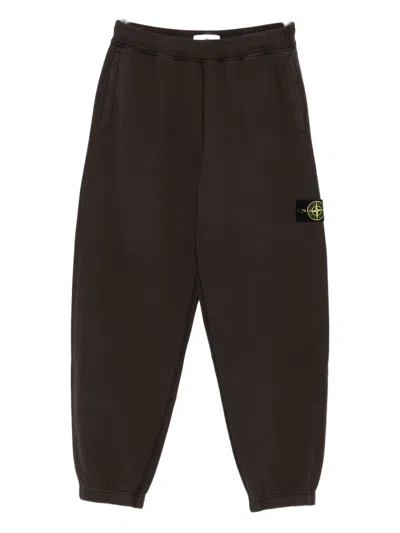 Stone Island 6200004 Logo-patch Cuffed Trousers In Brown