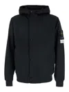 Stone Island Black Jacket With Hood With Buttons And Logo Patch On The Sleeve In Tech Fabric Stretch Man In Black