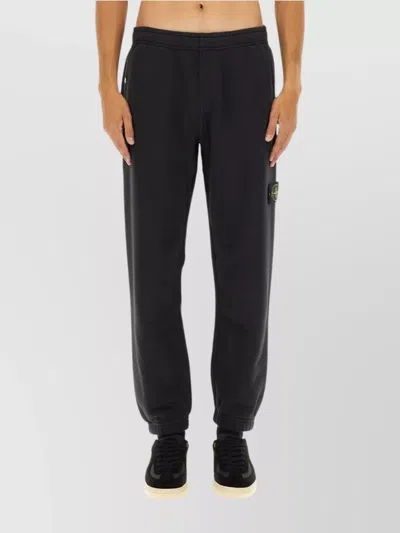 STONE ISLAND COMFORTABLE JOGGING TROUSERS FEATURING POCKETS