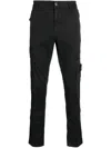 Stone Island Compass-motif Cotton Tapered Trousers In Black