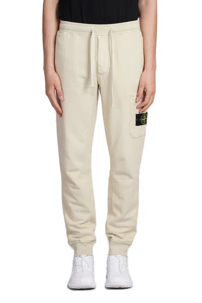 Stone Island Compass Patch Track Pants In Beige