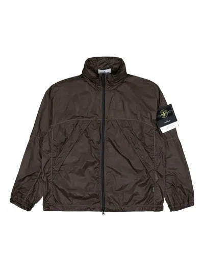 Stone Island Concealed-hood Zip-up Windbreaker In Brown