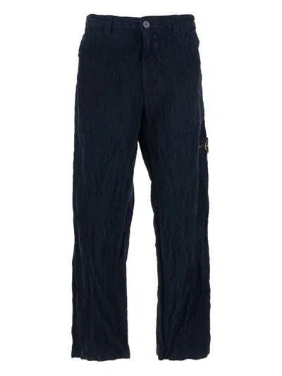STONE ISLAND CRINKLED EFFECT CORDUROY TROUSERS