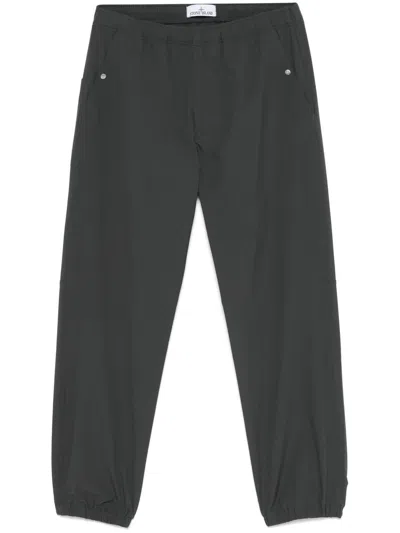 STONE ISLAND ELASTICATED TRACK PANTS