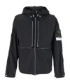 Stone Island Black Jacket With Compass Logo Patch Applied On The Sleeve In Tech Fabric Man In Black