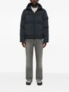 Stone Island Blue Down Jacket With Drawstring Hood And Logo Patch On The Sleeve In Tech Fabric Man In Black