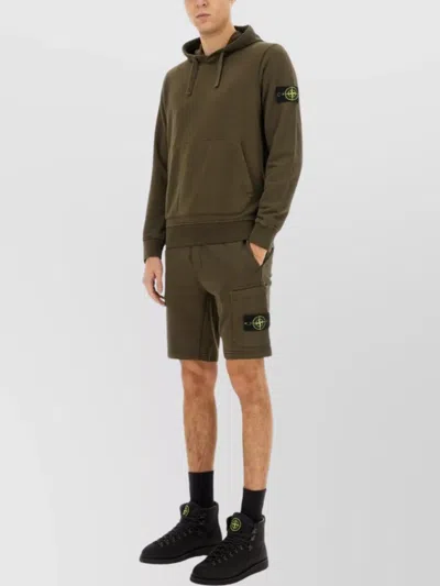 Stone Island Hooded Sweater With Ribbed Cuffs And Front Pocket In Green