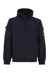 Stone Island Hoodie With Zip And Sleeve Pockets In Blue