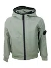 Stone Island Jacket In Water Resistant Technical Fabric With Hood And Zip Closure. Logo Applied On The Sleeve In Military