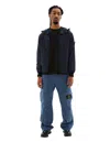 Stone Island Jacket With Patch On The Sleeve In Blue