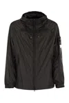 Stone Island Lightweight Hooded Jacket With Anti-drip And Reflective Details In Black