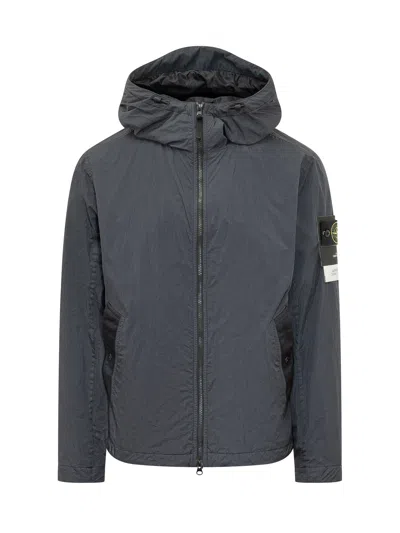 Stone Island Lightweight Jacket With Hood And Zip Closure In Blue
