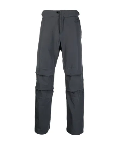 Stone Island Logo-embroidered Tapered Trousers In Gray