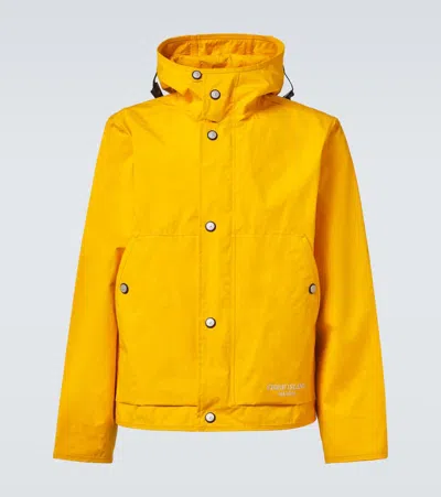 Stone Island Logo Laminated Cotton Poplin Raincoat In Yellow