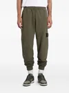 Stone Island Logo-patch Cuffed Track Pants In Green