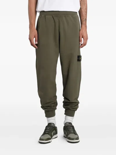 Stone Island Logo-patch Cuffed Track Pants In Green