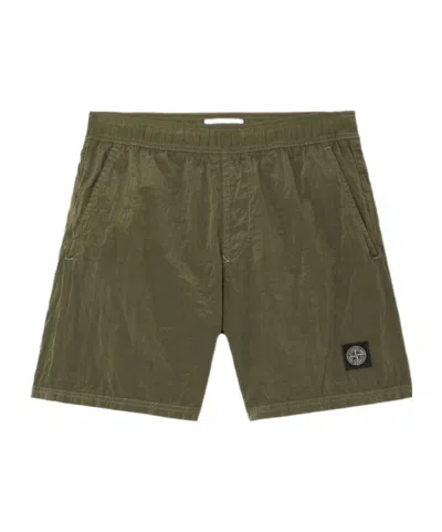 Stone Island Angled Hand Pockets. Back Pocket With Fixed Flap And Concealed Zipper Fastening. Eyelets On Back. Co In Green