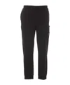 Stone Island Logo Patch Tapered Leg Sweatpants In Black