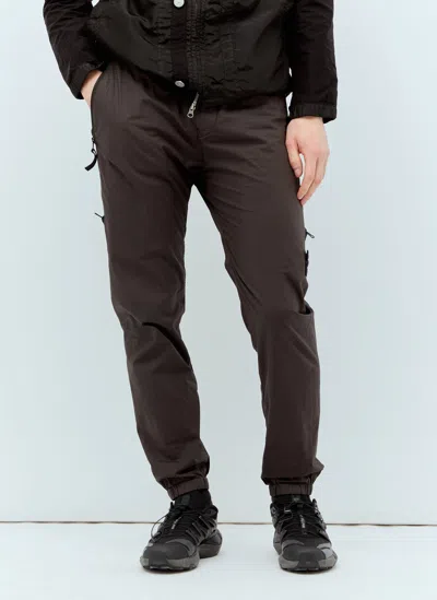 Stone Island Logo Patch Tapered Track Trousers In Black