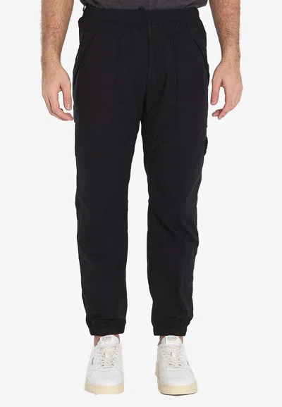 STONE ISLAND LOGO PATCH TRACK PANTS