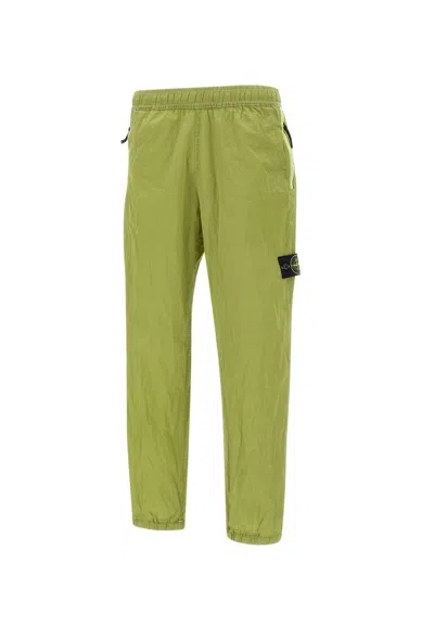 Stone Island Logo Patch Track Pants In Yellow