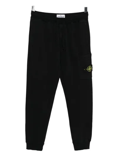 Stone Island Loose-fit Joggers With Pockets And Elasticateed Cuffs In Black