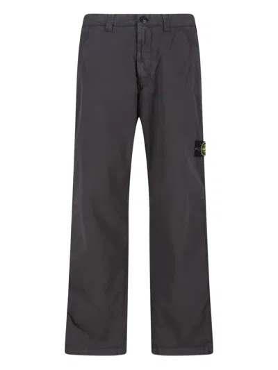 STONE ISLAND LOGO-PATCH TROUSERS