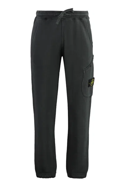 STONE ISLAND STONE ISLAND LOGO PRINT SWEATPANTS