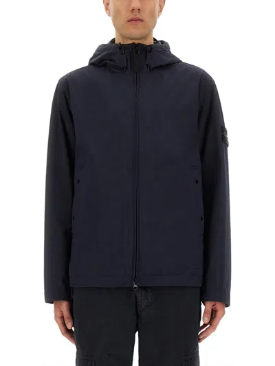 Stone Island Contemporary Hooded Jacket With Distinctive Logo Patch In Blue