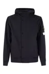 Stone Island Black Jacket With Hood With Buttons And Logo Patch On The Sleeve In Tech Fabric Stretch Man In Navy