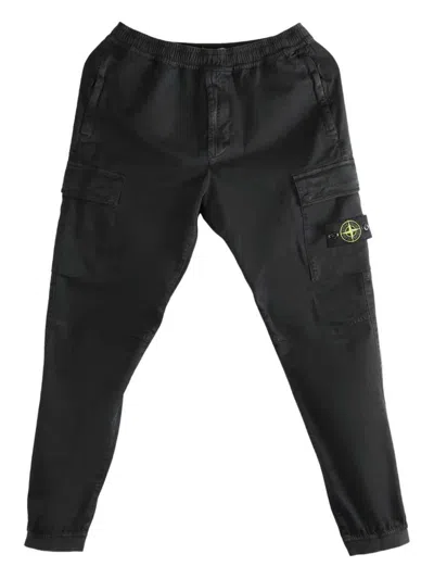 Stone Island Pantaloni Con Tasche Cargo In Black
