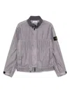 Stone Island Jacket With Transparent Resins And Foldable Co11ar In Blue