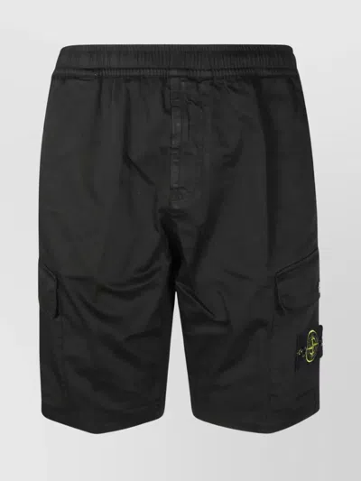 Stone Island Pocketed Buttoned Elastic Waistband Shorts In Nero