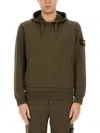 Stone Island Relaxed-fit Cotton Hoodie With Signature Sleeve Patch In Green