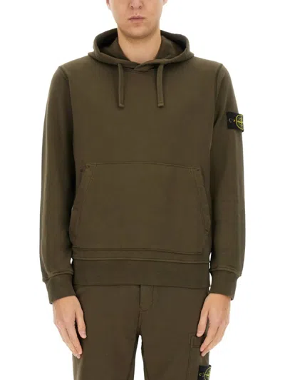 Stone Island Relaxed-fit Cotton Hoodie With Signature Sleeve Patch In Green