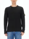 Stone Island Ribbed Wool Sweater With Distinctive Logo Patch In Black