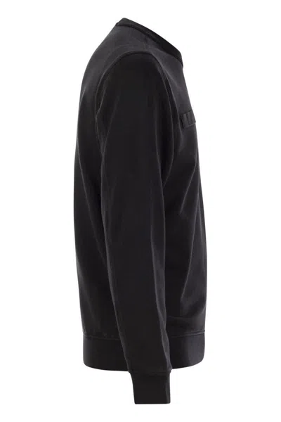 Stone Island Round-neck Sweatshirt With Zipped Sleeve Pocket In Black